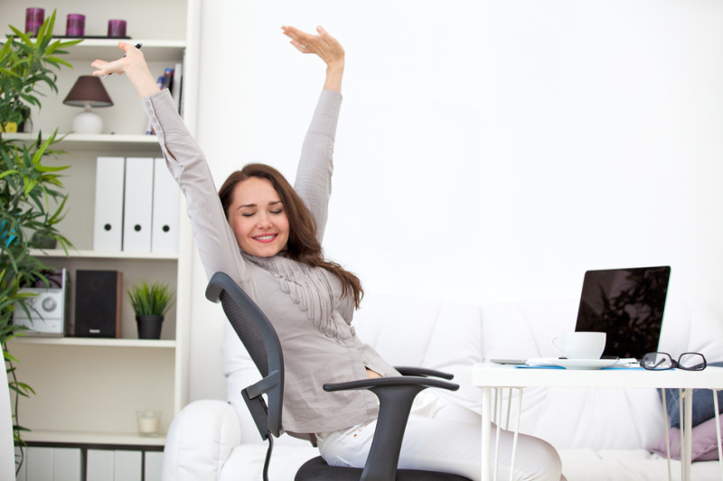 woman stretching at workplace